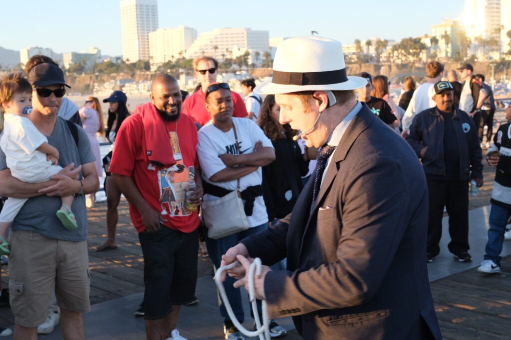 Corporate magician performing close-up magic at Orange County business event